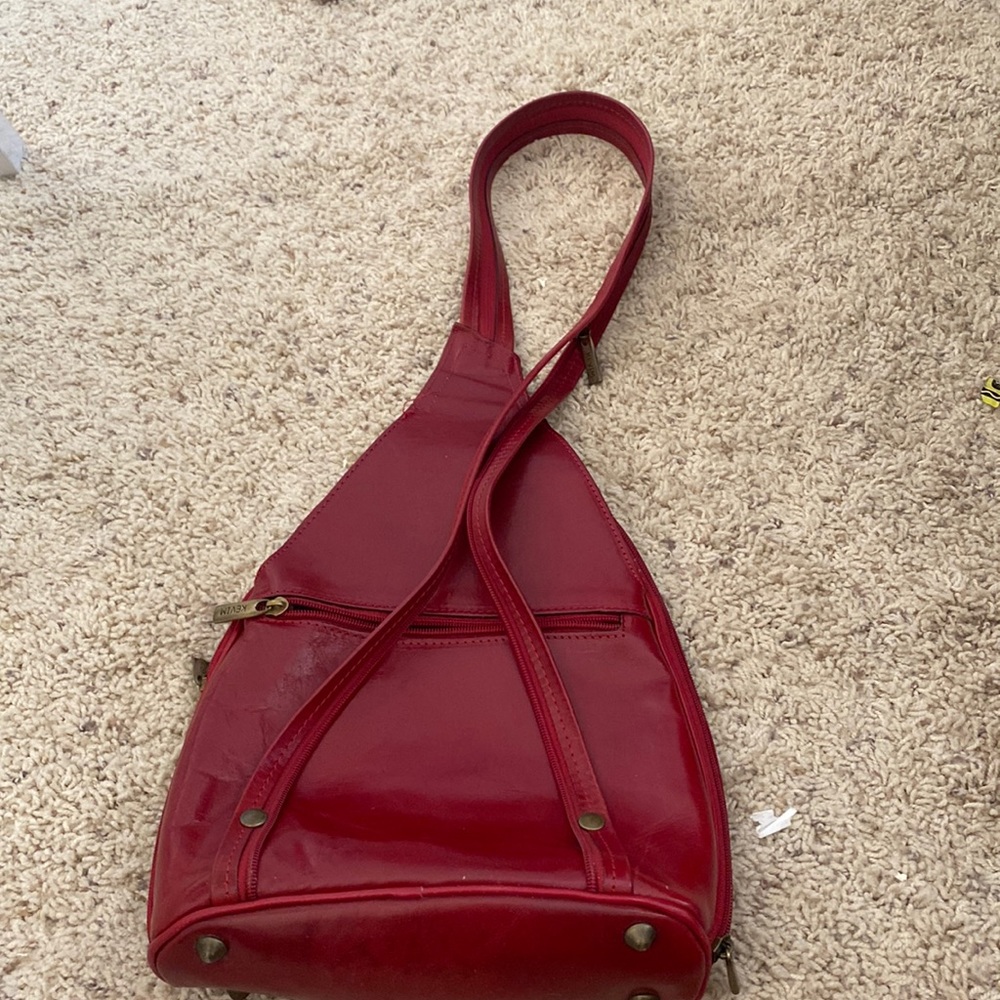 Red leather bag   Convertible to back pack or a shoulder strap